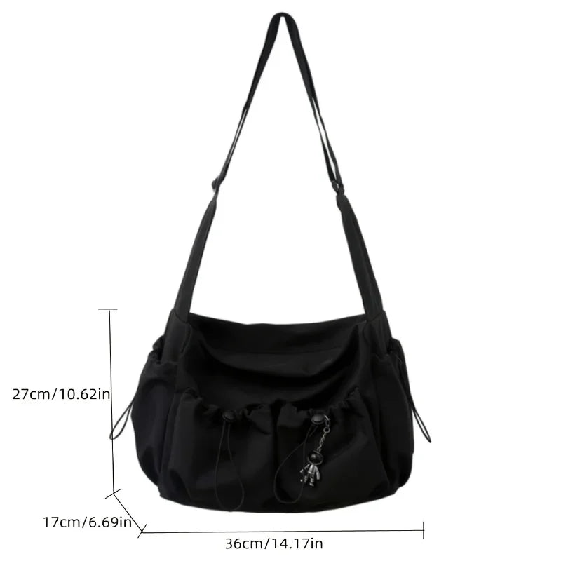 Fashionable Crossbody Bag Drawstring Accent - Spacious Secure Zipper Closure Includes Stylish Charm