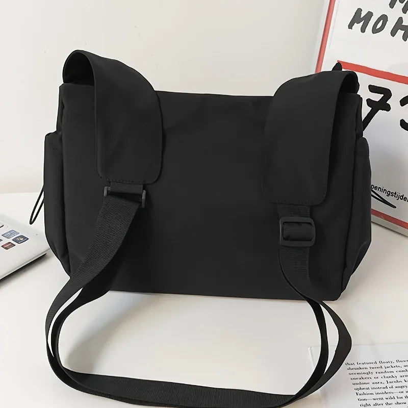 Fashionable Crossbody Bag Drawstring Accent - Spacious Secure Zipper Closure Includes Stylish Charm