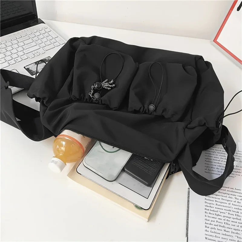 Fashionable Crossbody Bag Drawstring Accent - Spacious Secure Zipper Closure Includes Stylish Charm